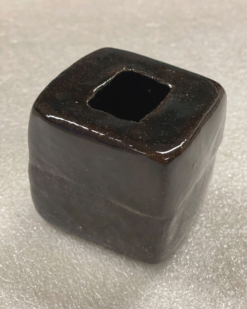 Nic’s clay desk cube, photo courtesy of the author. 