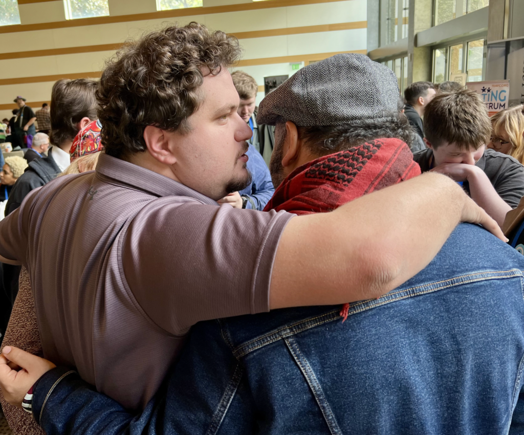 Neurodivergent actor/writer/director Atticus Baldwin embraces his hero Jorge Gutierrez | Photo by Jeudi Brealey